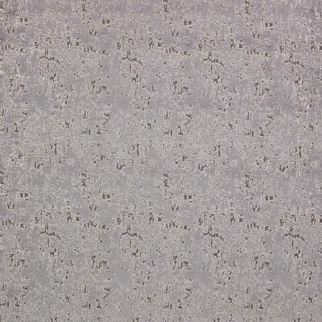 Close-up of a silver-grey abstract woven fabric with mottled weathered texture