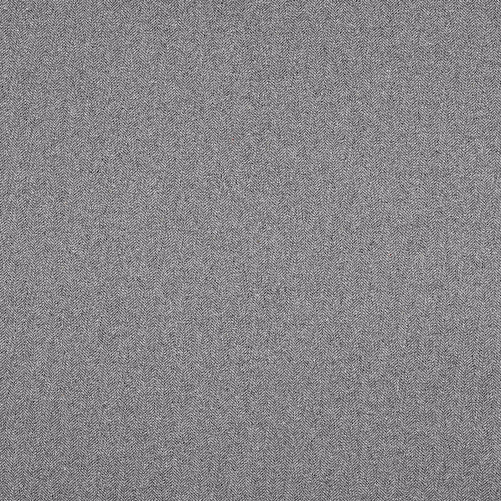 Close-up of cool charcoal grey herringbone woven fabric with fine zigzag texture
