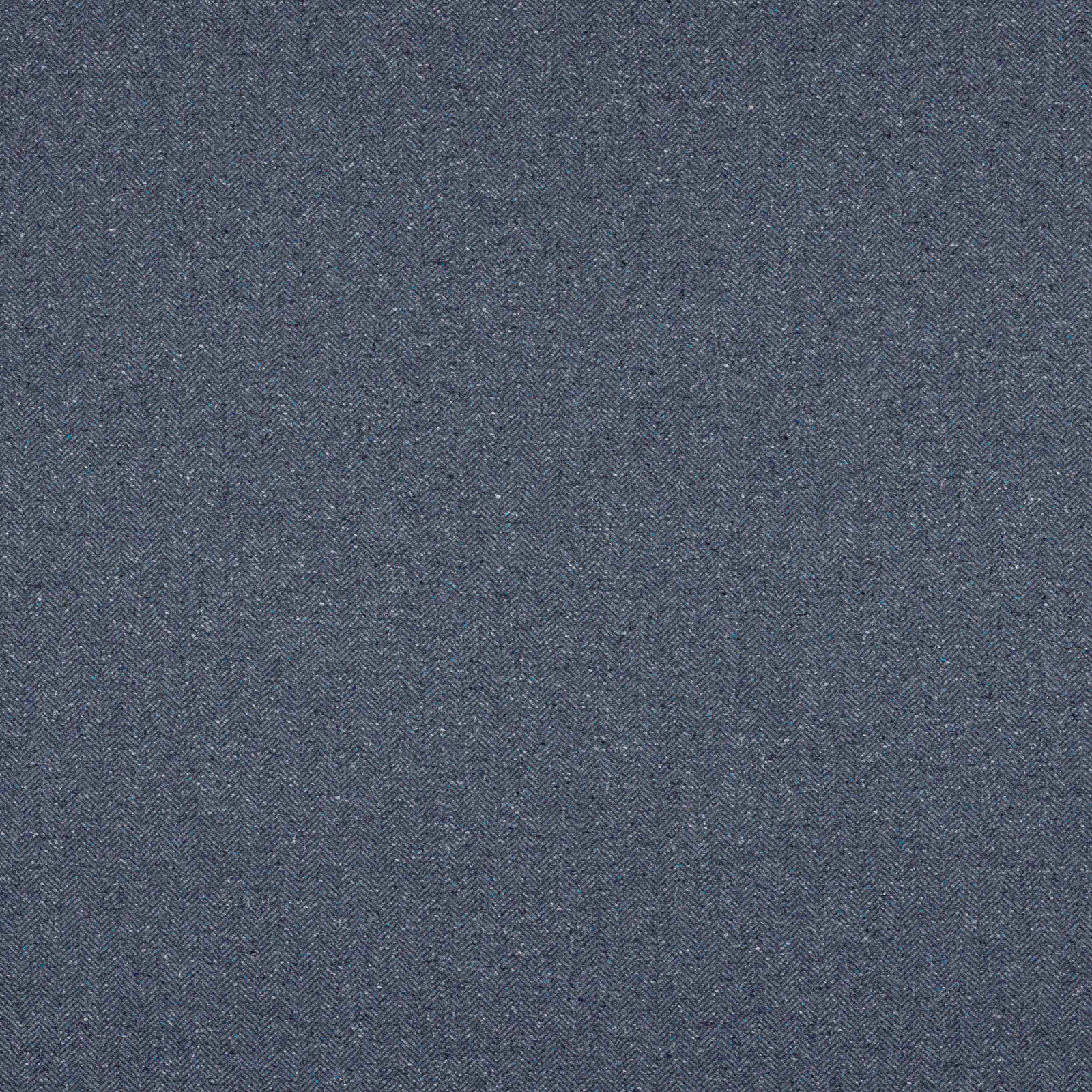 Close-up of muted navy herringbone fabric with fine woven texture