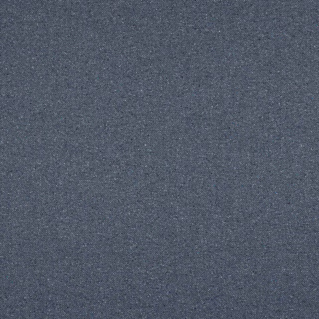 Close-up of muted navy herringbone fabric with fine woven texture