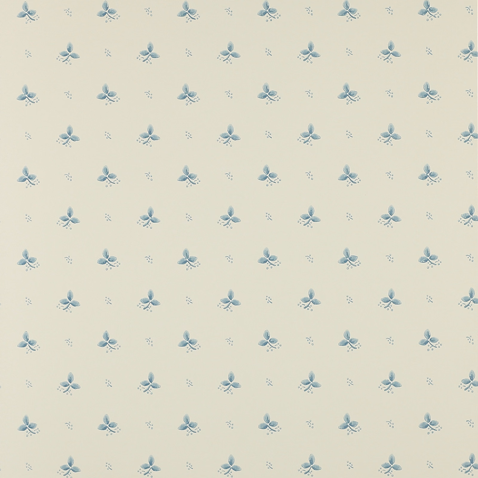 Pale blue-grey floral sprigs and tiny dots on an ivory wallpaper ground