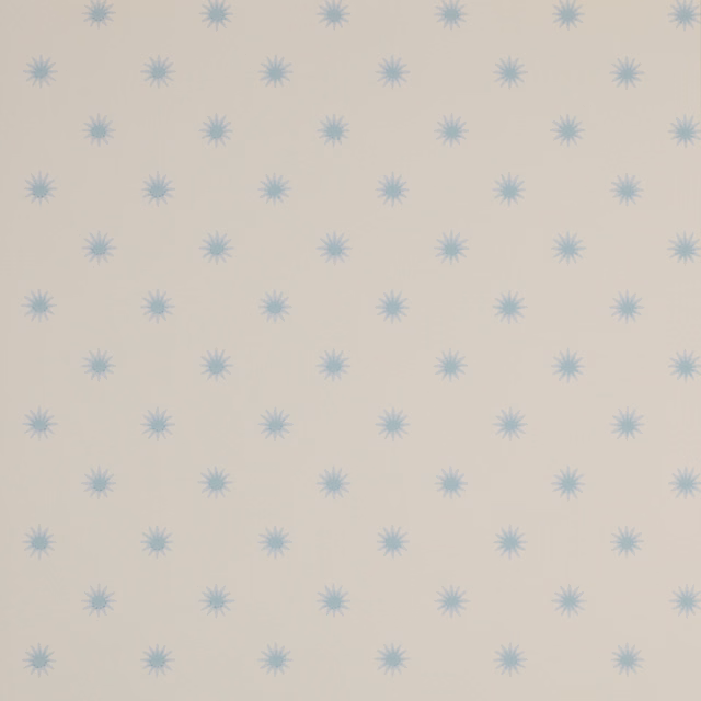 Cream wallpaper with evenly spaced pale powder-blue starburst motifs in a small geometric repeat