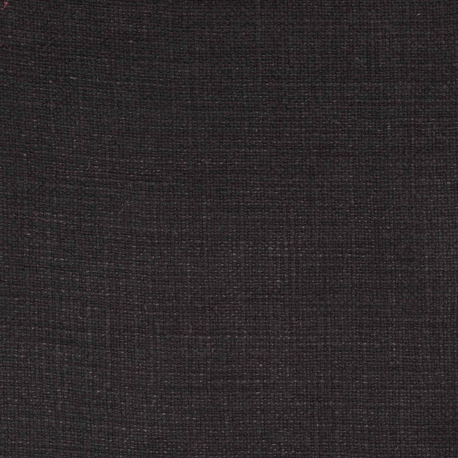 Close-up of dark charcoal-black linen weave with fine matte texture