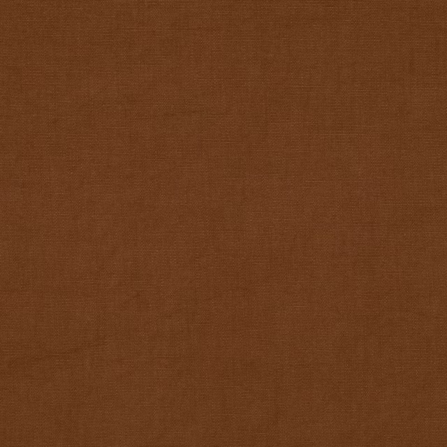 Close-up of plain warm copper-brown linen with a fine tight weave