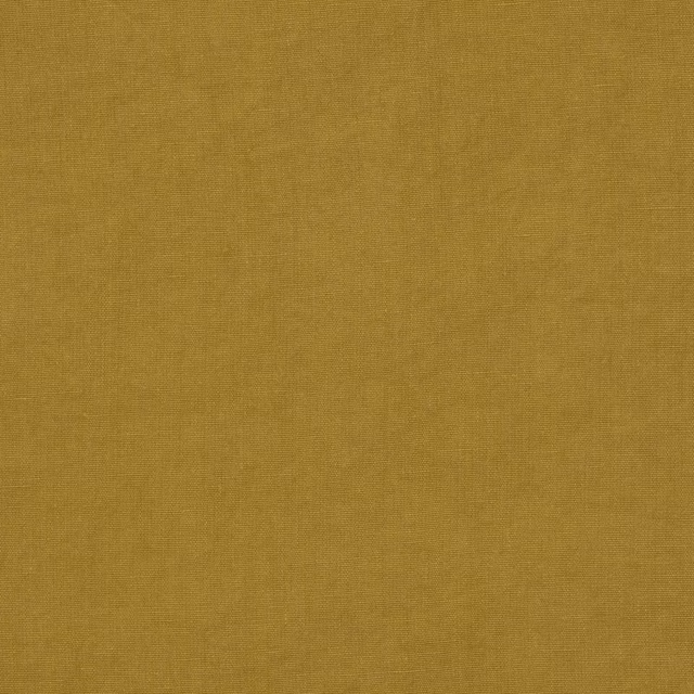 Muted saffron-gold linen swatch with a fine, even plain weave