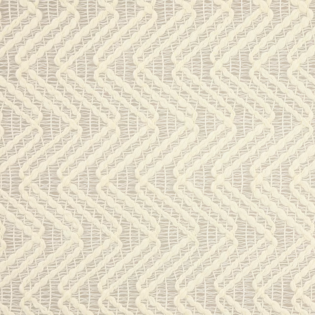 Cream wool fabric with raised zigzag weave on an open ground