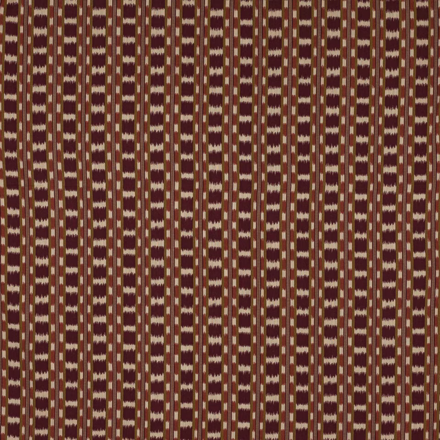 Vertical woven stripe fabric in deep grenat red, cream and ochre tones