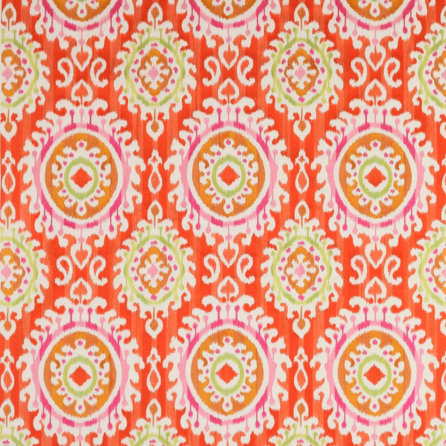 Coral-orange woven fabric with large circular medallions in pink, cream and green