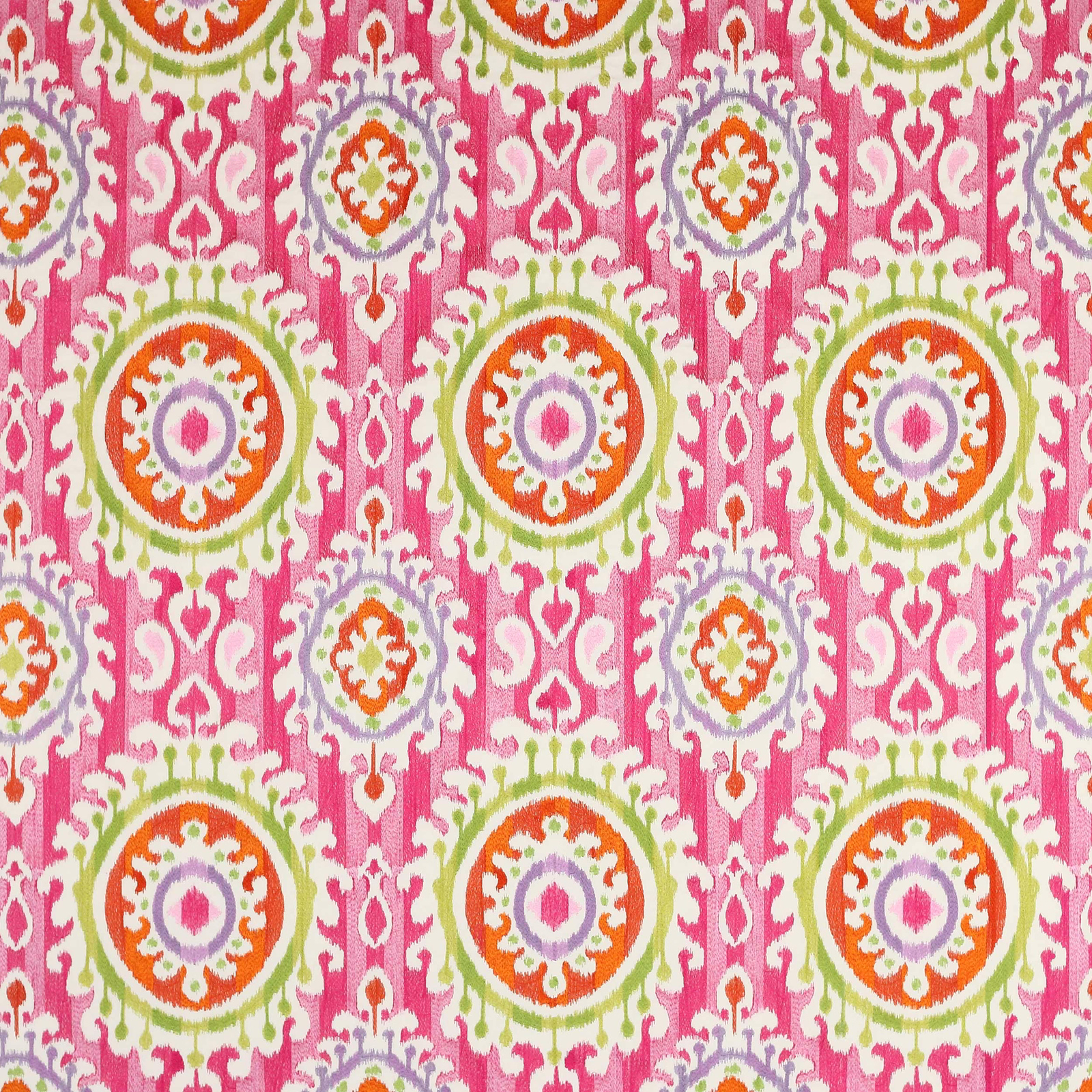 Bright fuchsia patterned fabric with circular medallions in green, orange and lilac