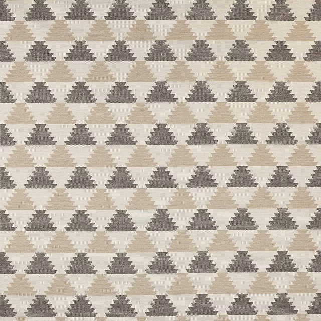 Close-up of a taupe and stone geometric fabric with stepped triangle rows