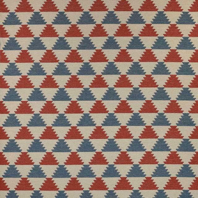 Cream fabric with rows of small red and blue triangular geometric motifs