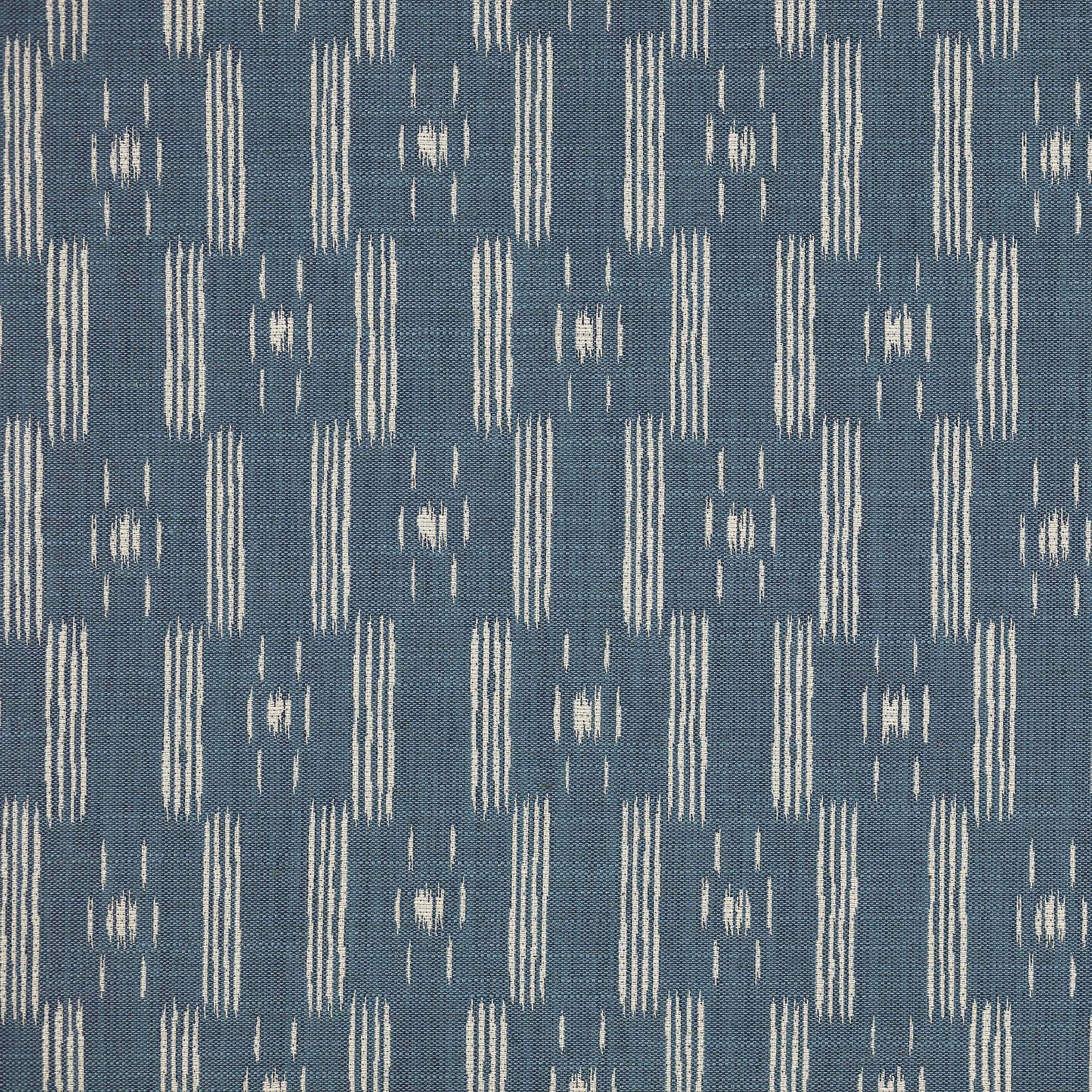 Blue woven geometric fabric with ivory vertical bars and small broken motifs