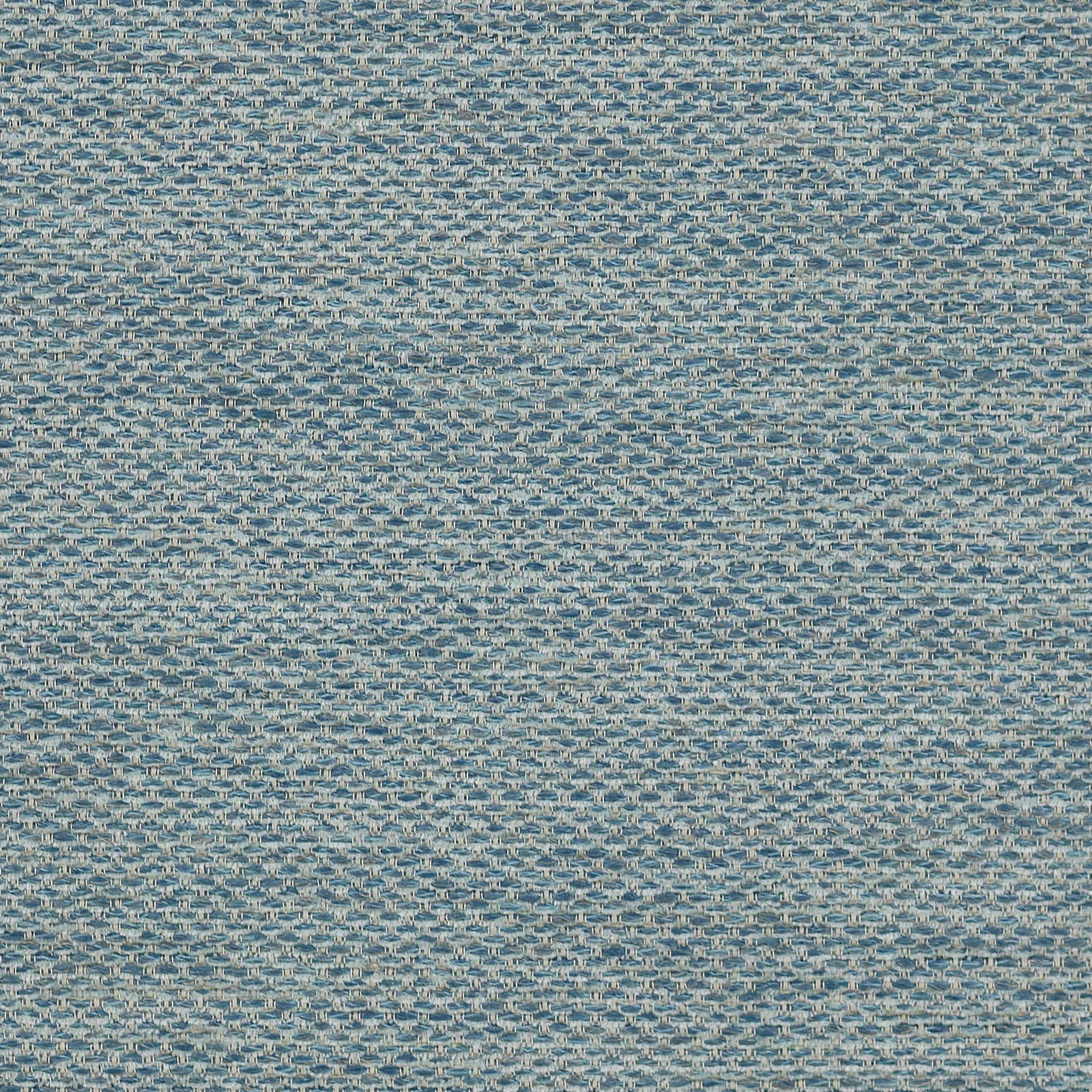 Close-up of a softly textured blue woven fabric with speckled pale highlights
