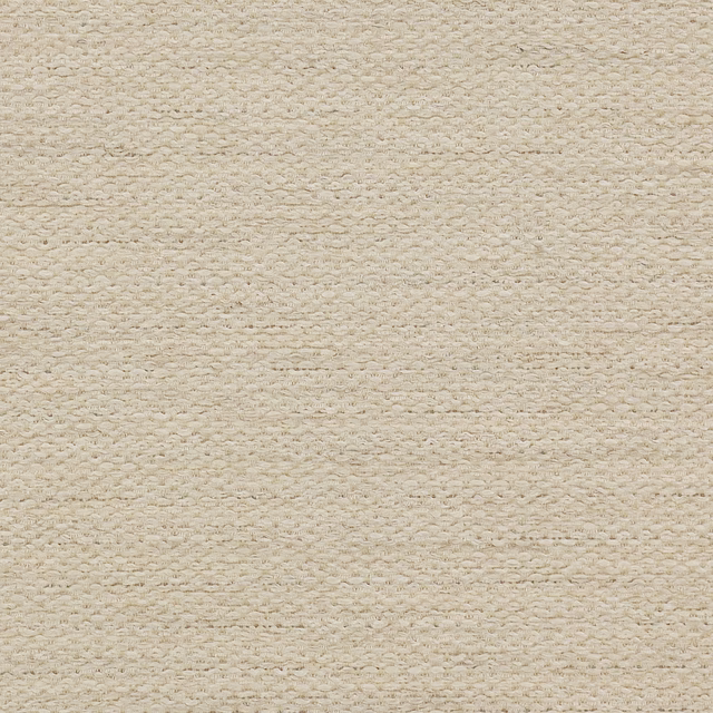 Close-up of a soft warm cream woven fabric with subtle slubby texture