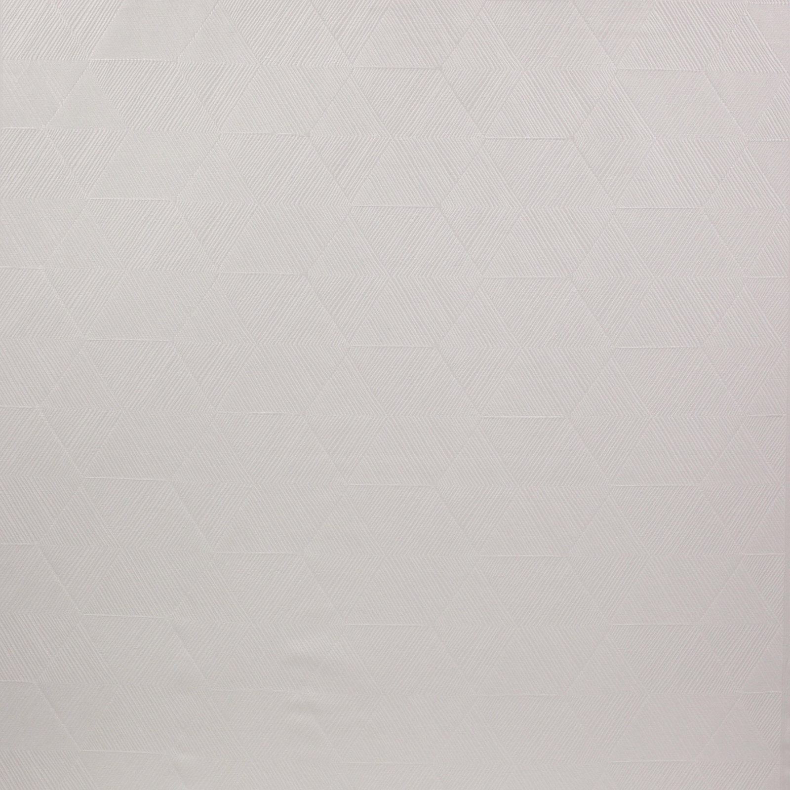 Pale ivory geometric woven fabric with subtle faceted texture
