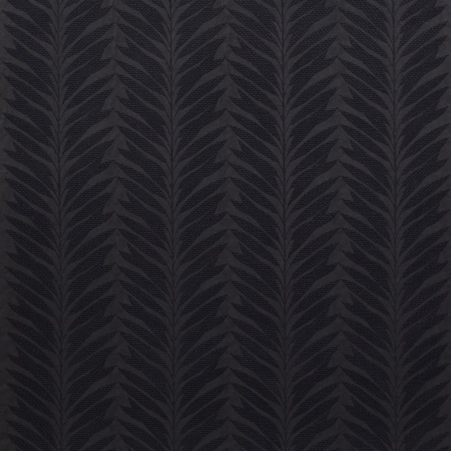 Dark charcoal leaf-pattern woven fabric swatch with subtle textured stripes
