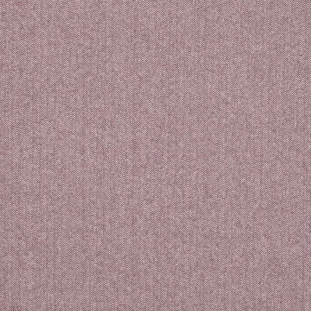 Close-up of muted aubergine herringbone weave in a fine small-scale pattern