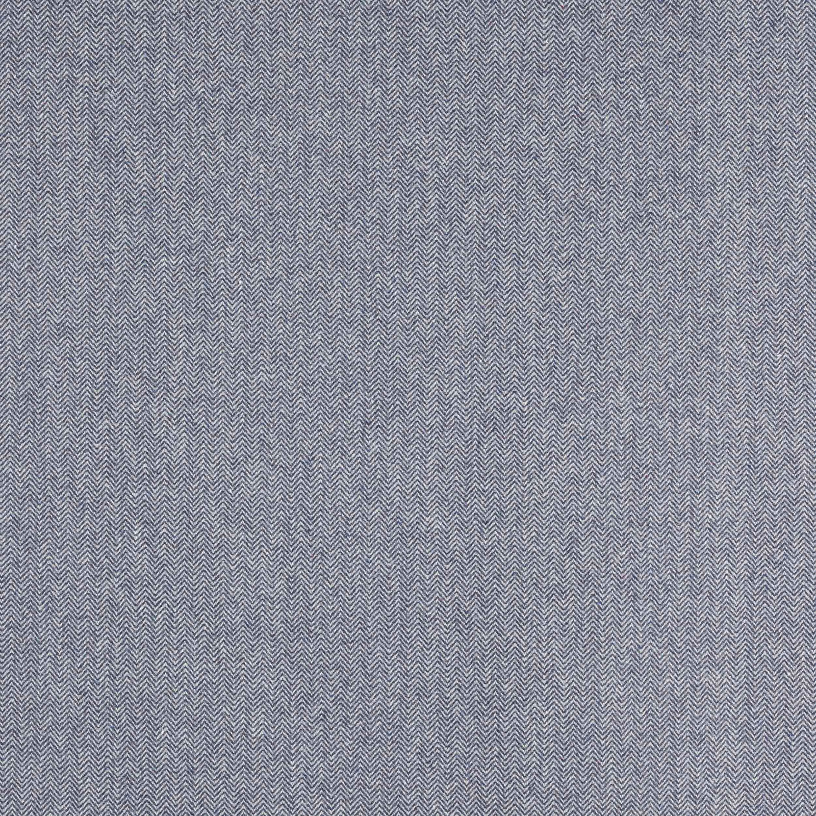 Close-up of a soft grey-blue chevron woven fabric with fine texture