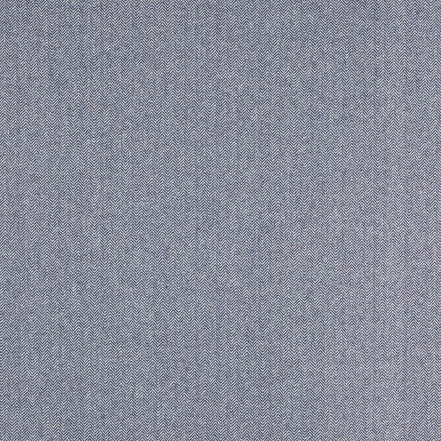 Close-up of a soft grey-blue chevron woven fabric with fine texture