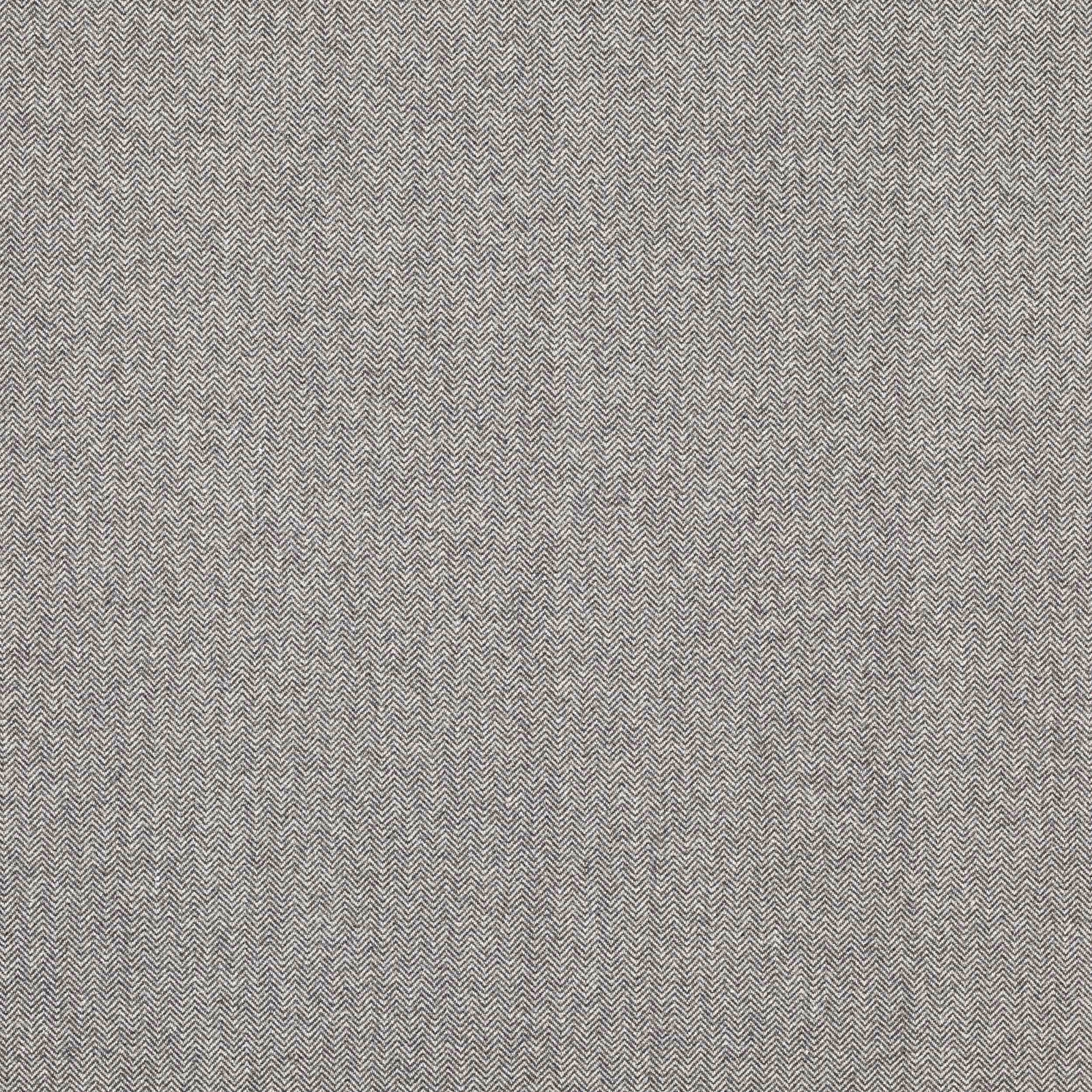 Close-up of charcoal grey herringbone weave with fine zig-zag texture