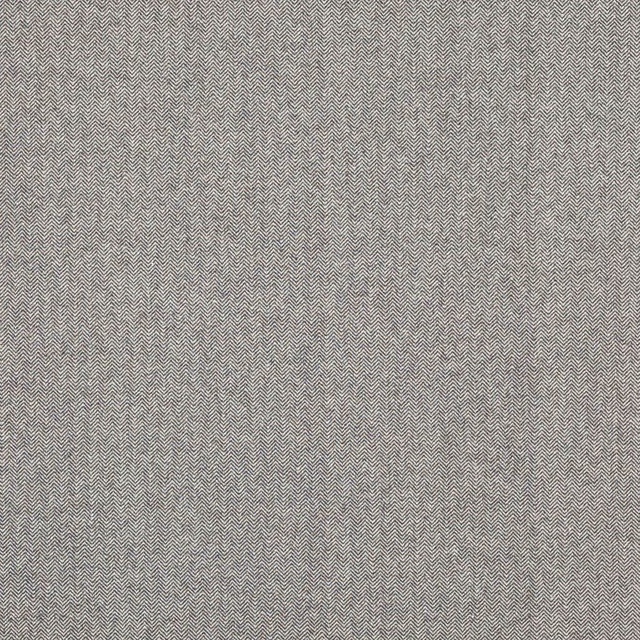 Close-up of charcoal grey herringbone weave with fine zig-zag texture