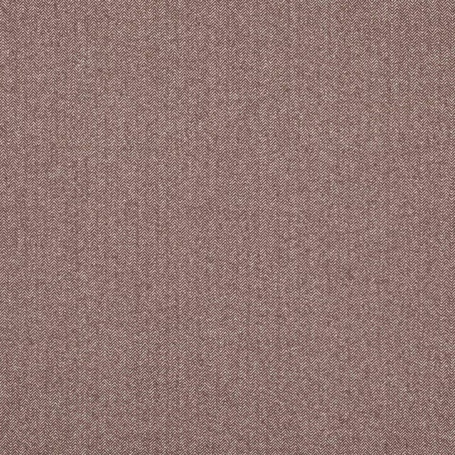 Close-up of warm chocolate-brown herringbone woven fabric with fine texture
