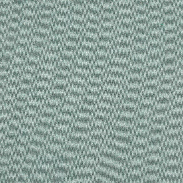 Soft sage green chevron weave fabric with a fine herringbone texture