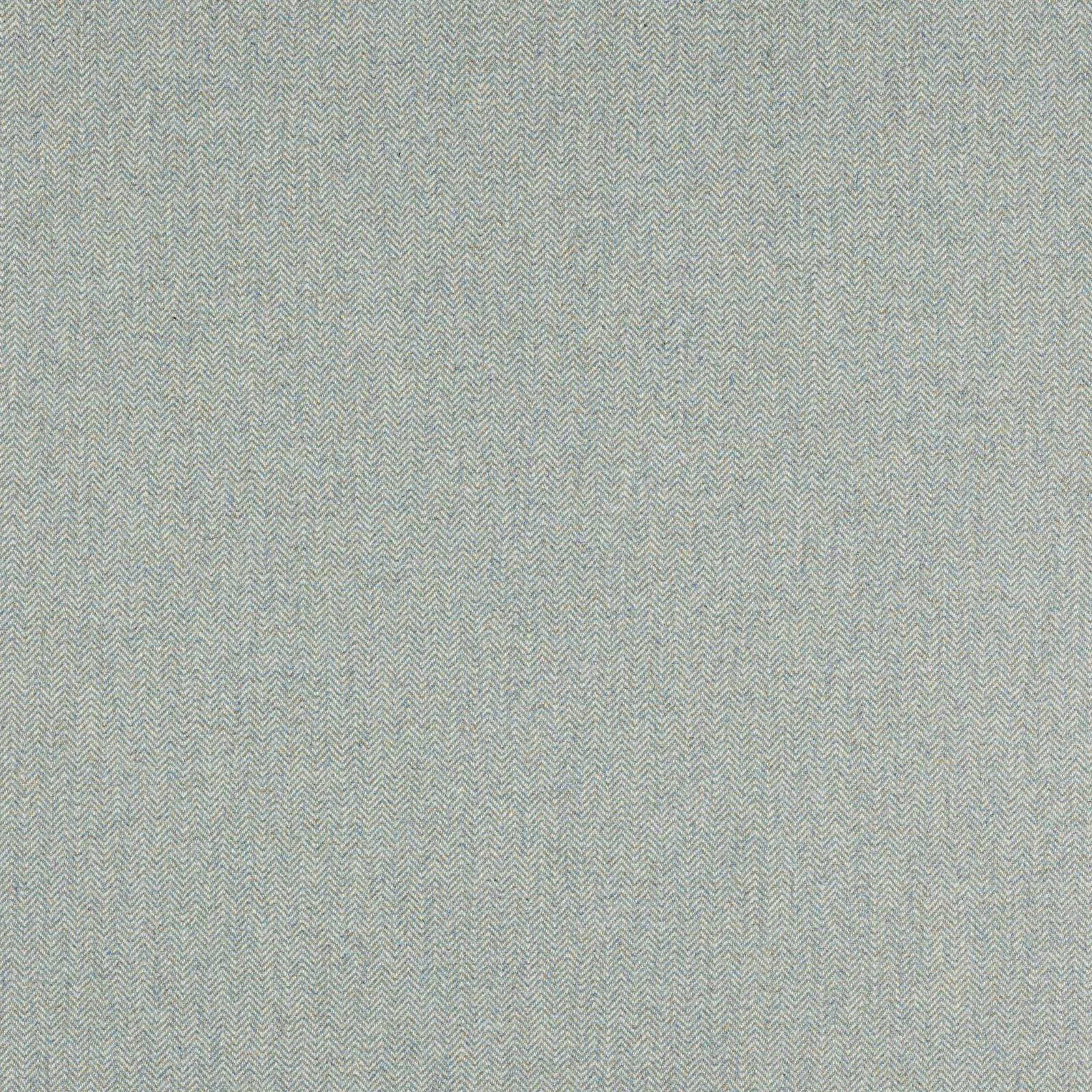 Close-up of soft jade green herringbone weave fabric with fine texture