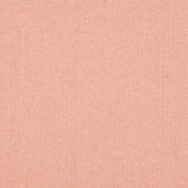 Soft peach-orange herringbone fabric with a fine textured weave