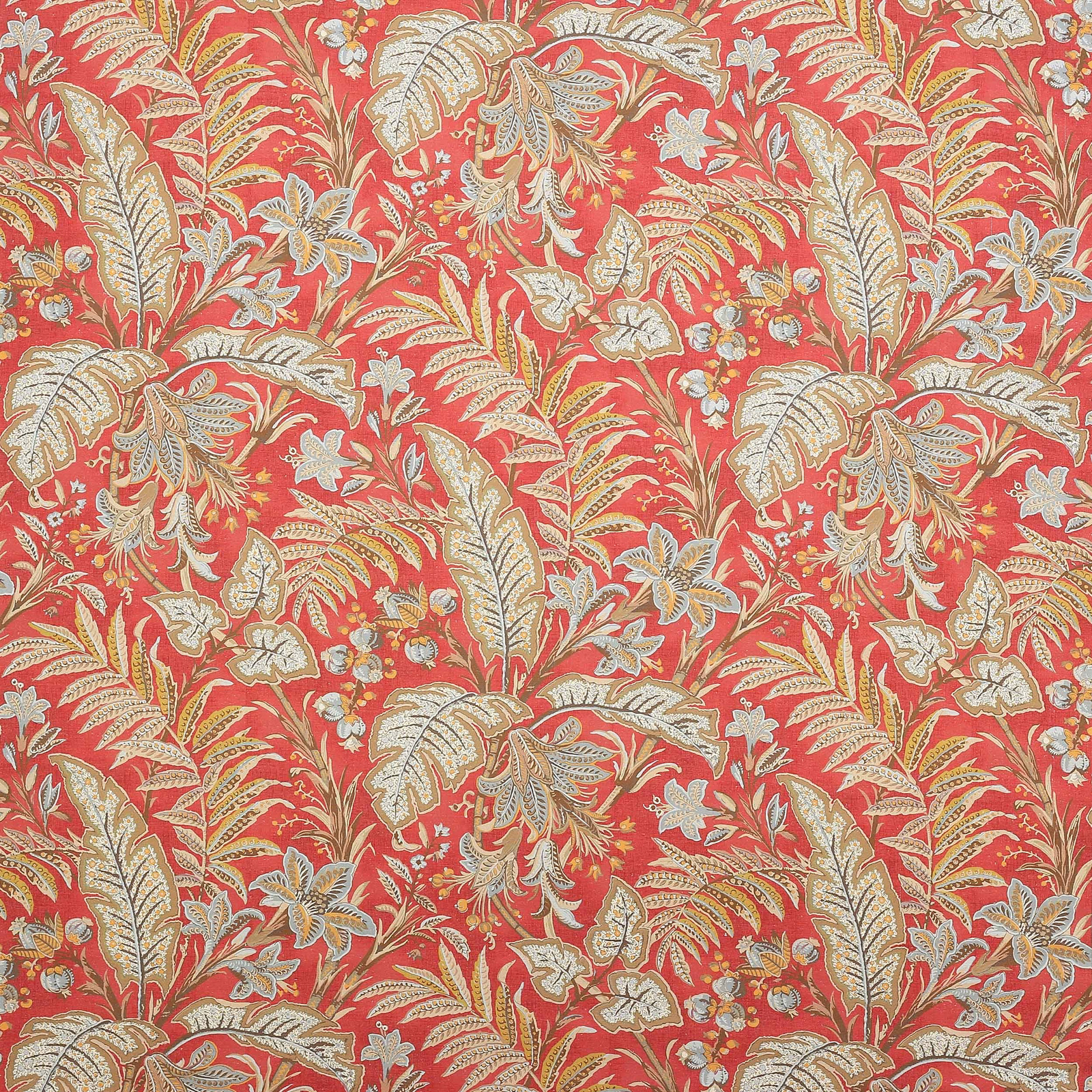 Coral red linen fabric with large cream leaf and paisley motifs and pale blue details