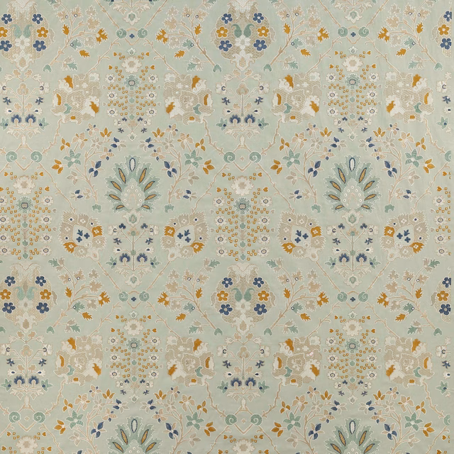 Pale aqua damask fabric with ivory outlines, mustard accents and soft blue motifs