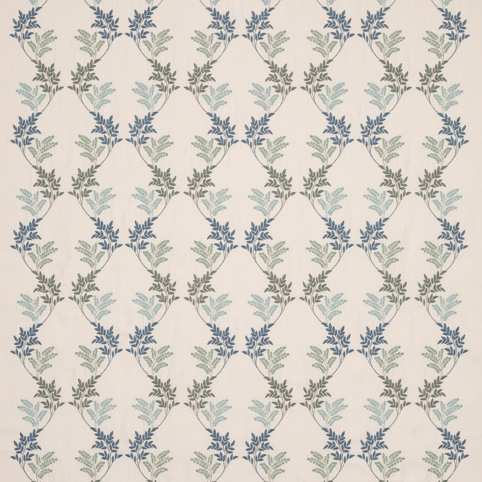 Blue and sage leaf lattice pattern on a pale ivory woven fabric