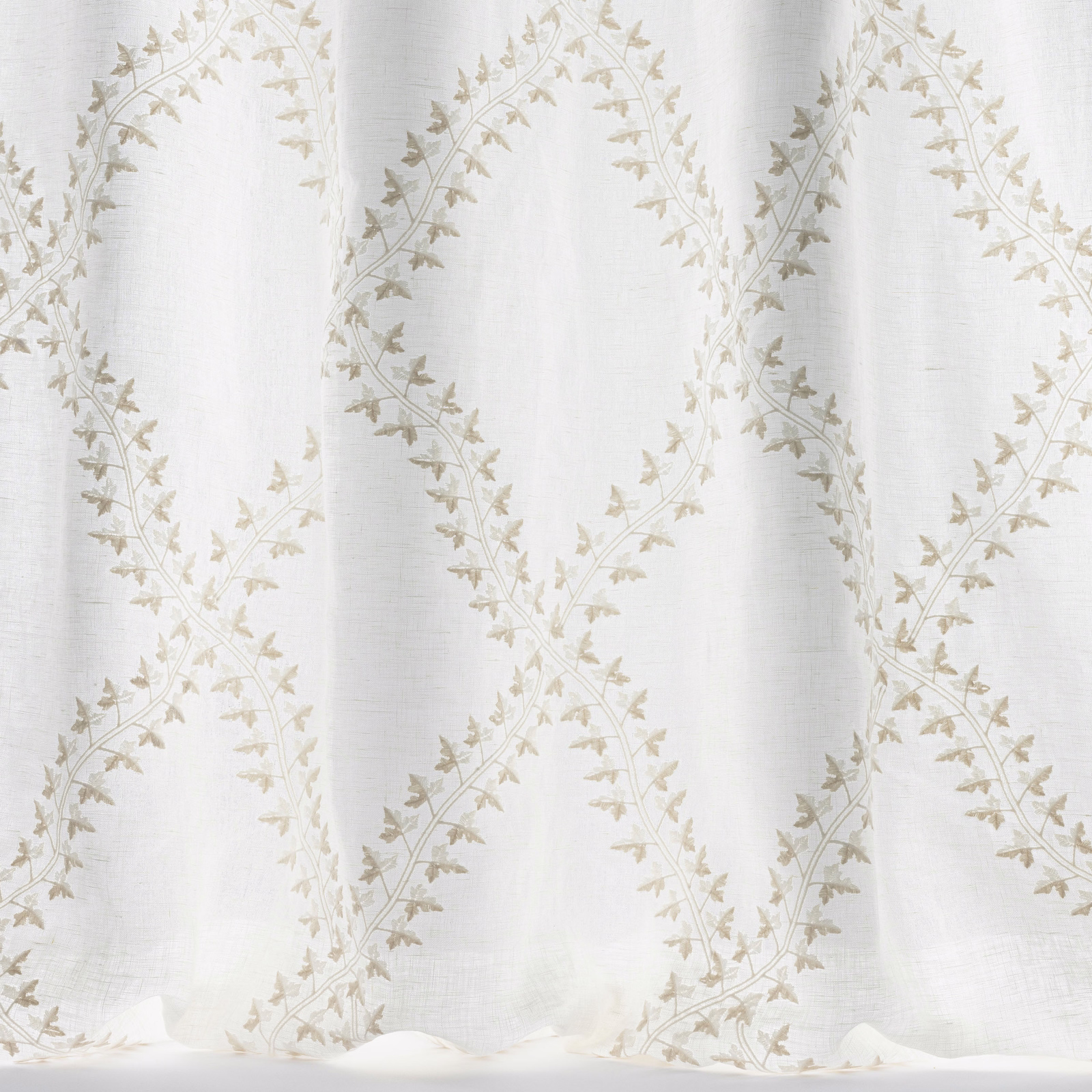 Ivory linen-blend fabric with pale beige trellis vine and leaf motif