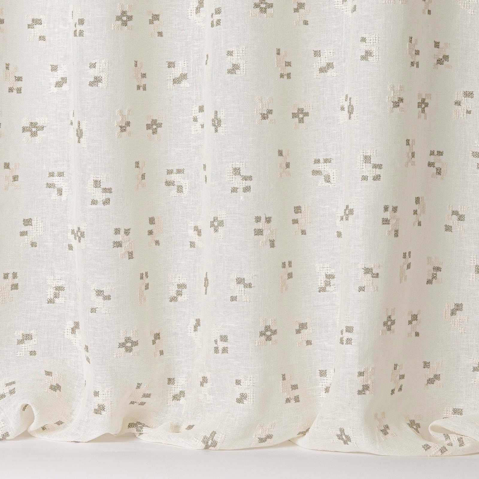 Ivory linen-blend fabric with small taupe scattered motif and soft slub texture