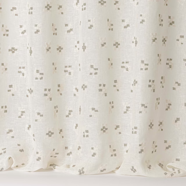 Ivory linen-blend fabric with small taupe scattered motif and soft slub texture