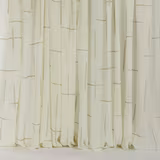 Cream wool curtain fabric with fine sand-coloured linear marks and soft folds