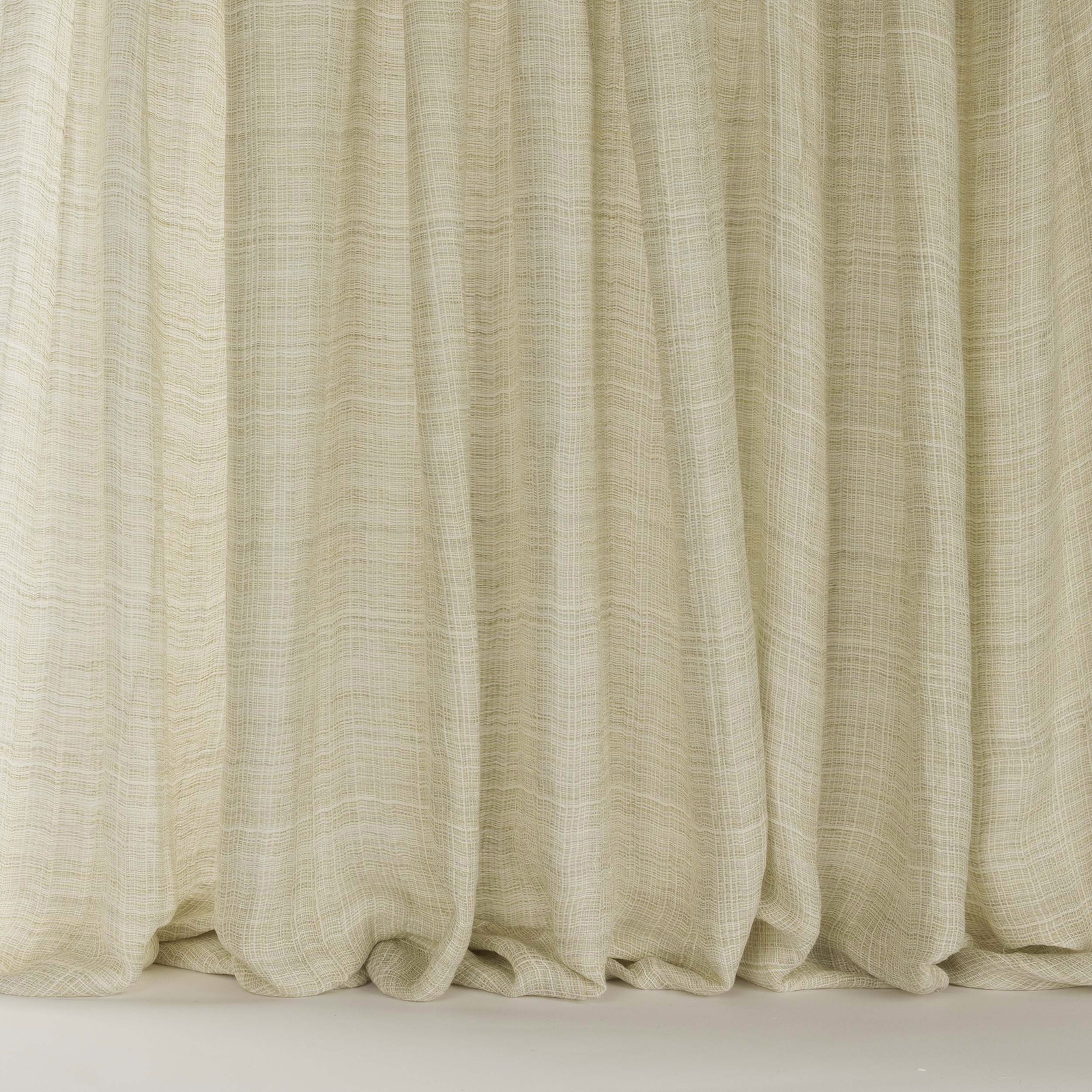 Soft clay beige linen-blend curtain fabric with a subtle open weave and vertical folds
