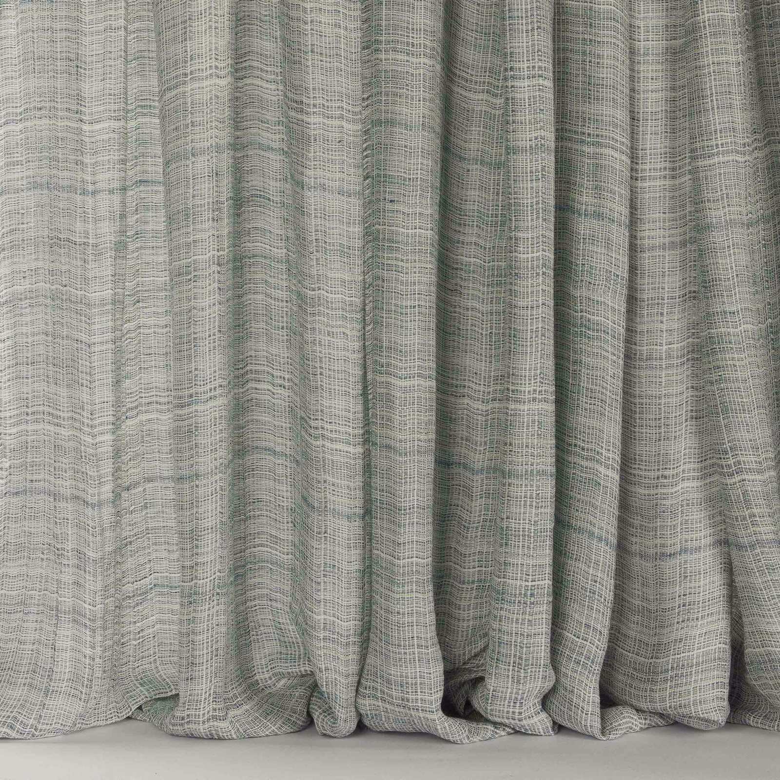 Wide pale aqua-green linen drape with fine vertical strié texture