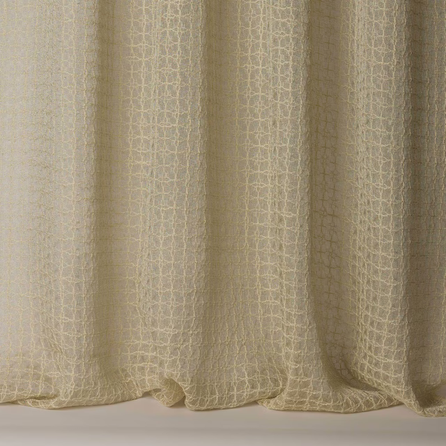 Warm clay-beige textured fabric with a fine cracked grid weave and soft folds