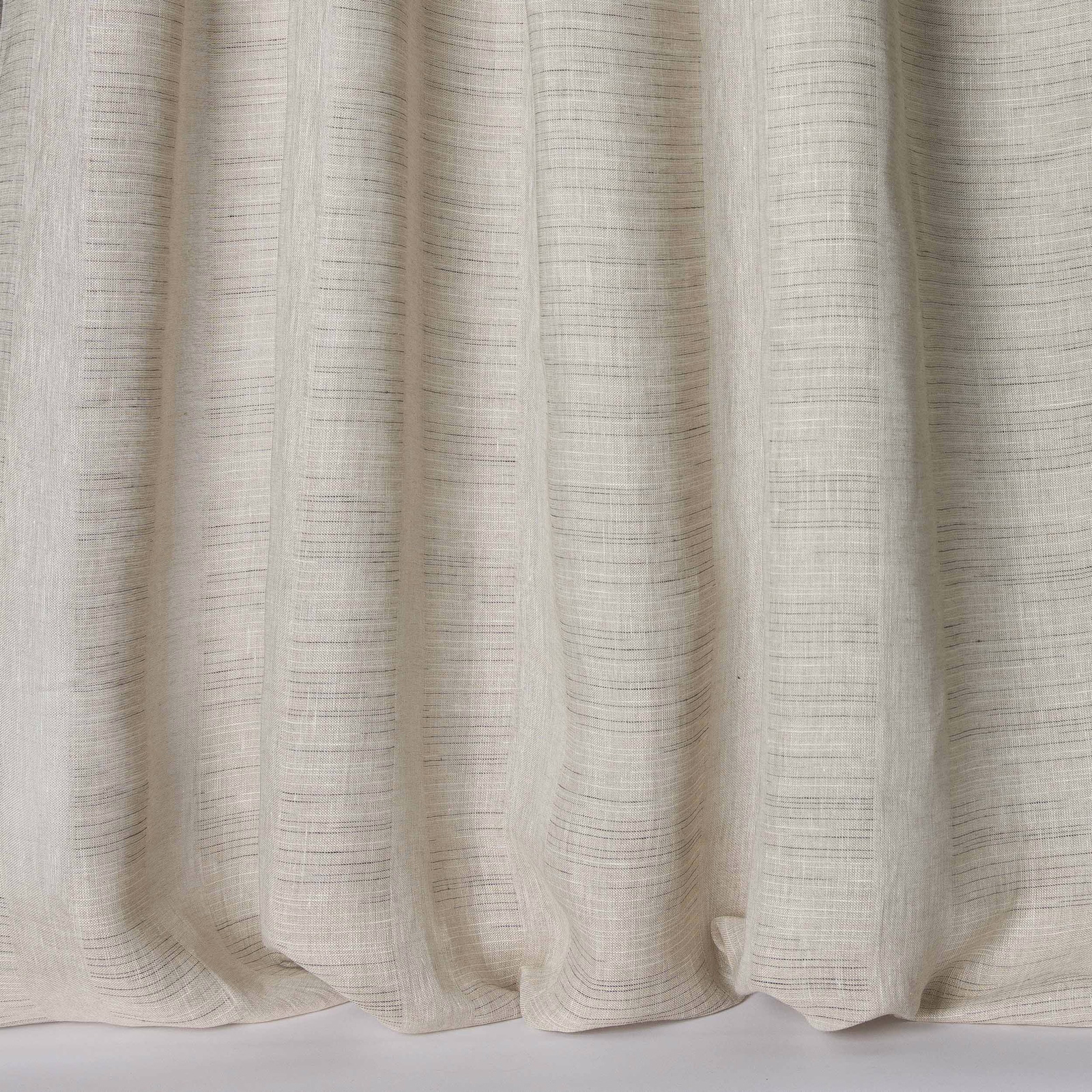 Soft ivory linen fabric with fine slubbed texture and gentle drape