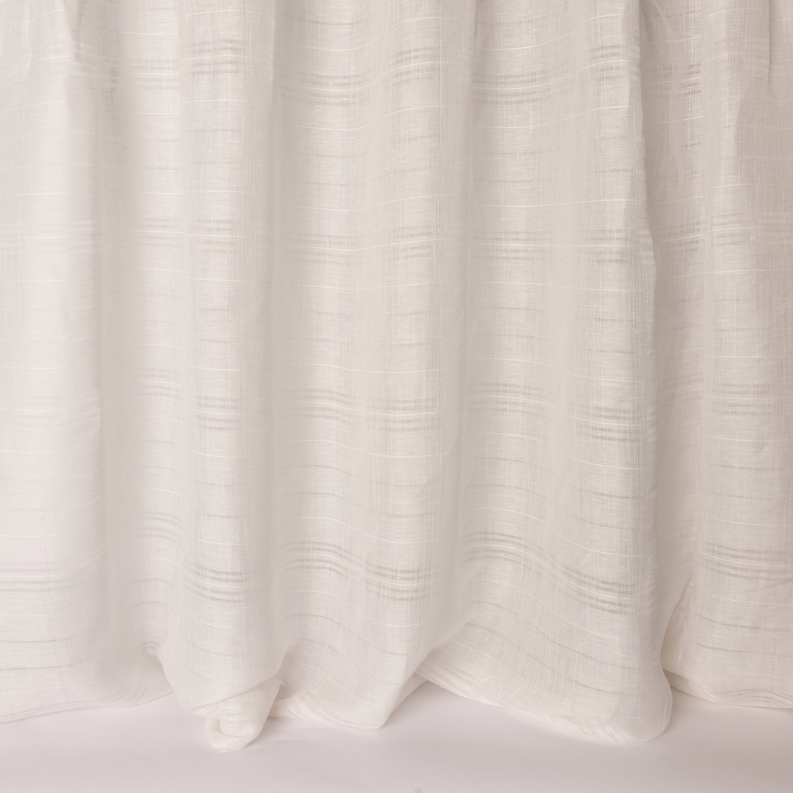 Soft ivory linen-blend curtain fabric with subtle horizontal slub texture