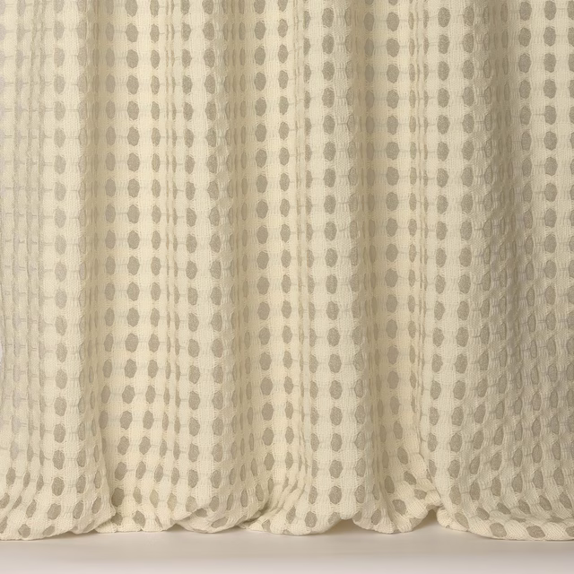 Cream woven fabric with vertical clay-coloured dotted stripes and soft texture
