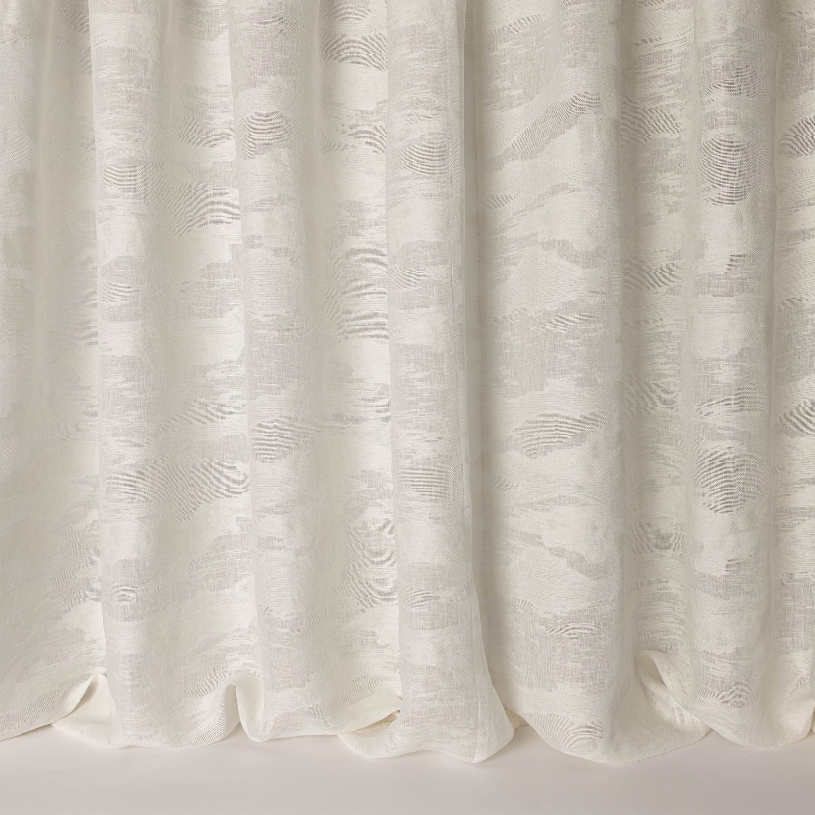 Ivory cream fabric with subtle abstract tonal pattern and soft linen texture