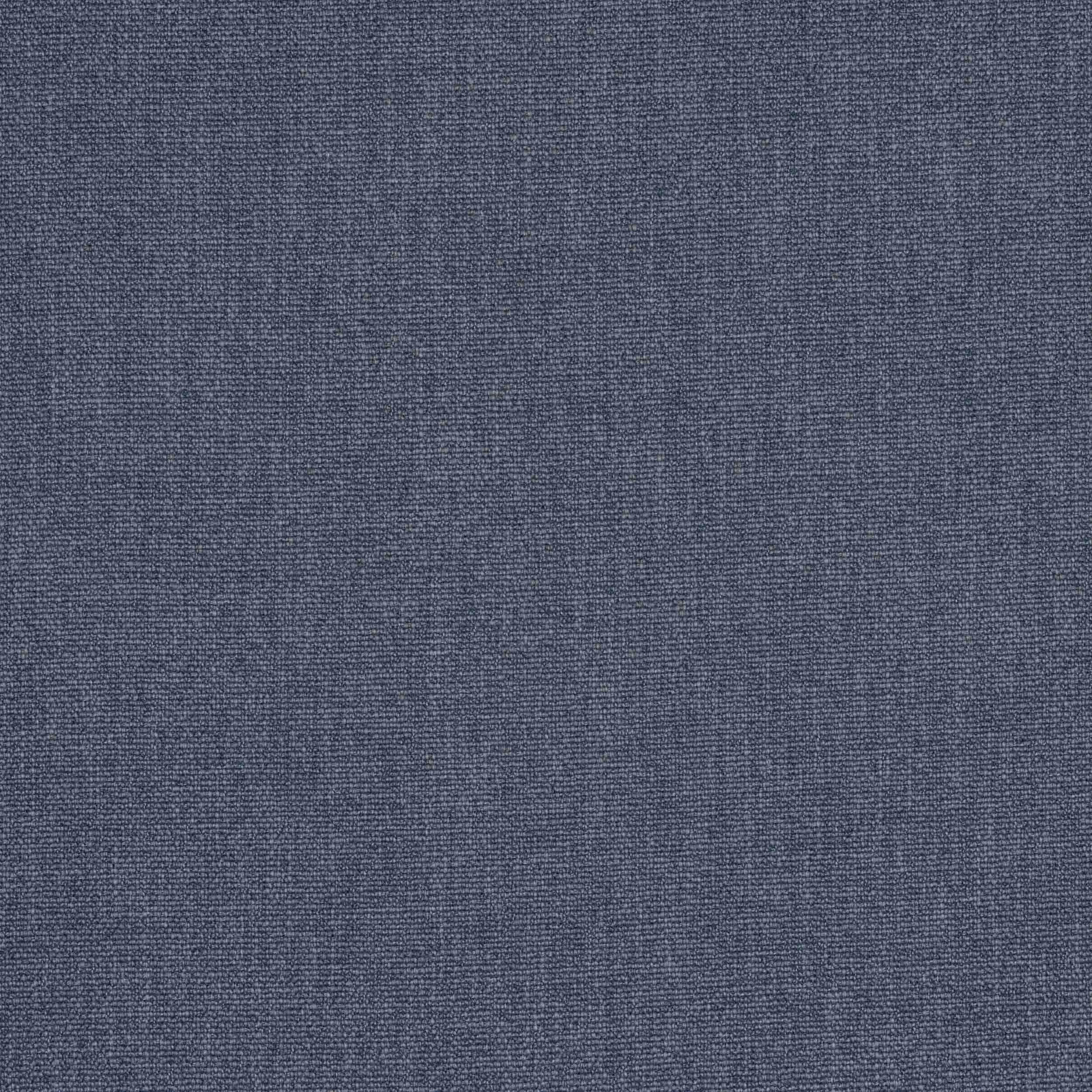 Close-up of muted denim blue woven fabric with fine textured surface