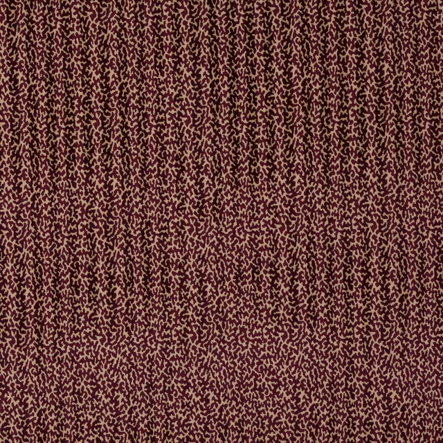 Deep prune velvet fabric with fine abstract mottled pattern and soft sheen