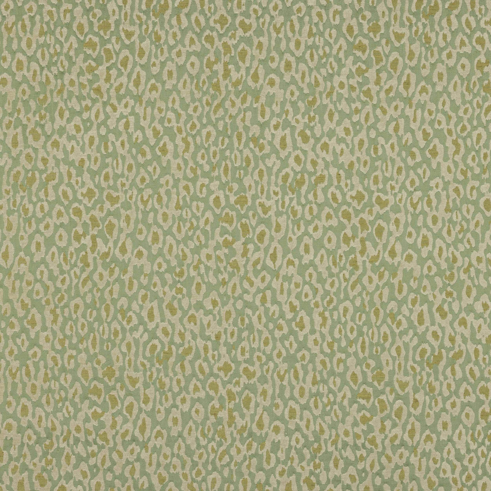 Jade green patterned fabric with cream and golden irregular spots