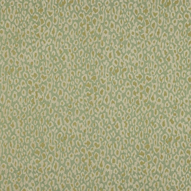 Jade green patterned fabric with cream and golden irregular spots