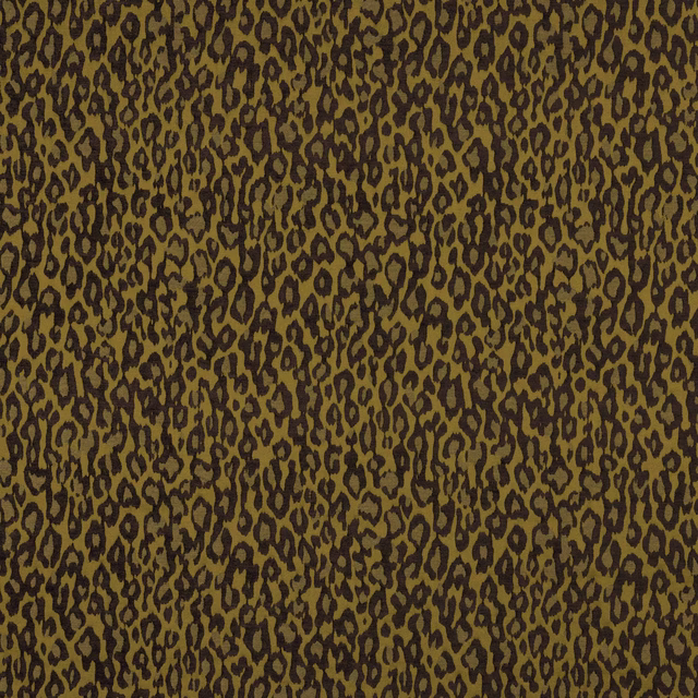 Ochre and deep prune animal-pattern fabric with dense all-over spotting