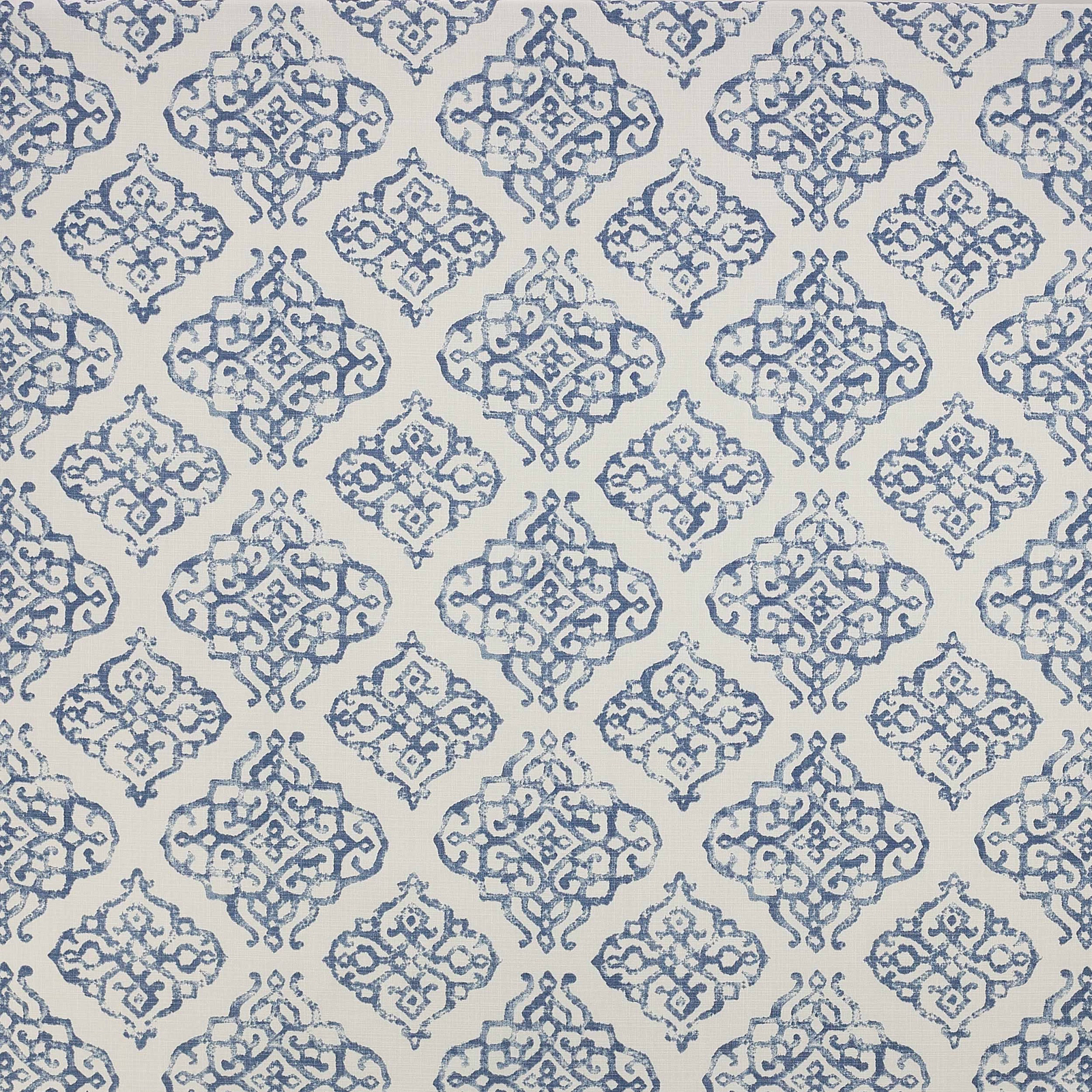 Blue ornamental lattice print on a pale cotton ground, shown as a fabric swatch