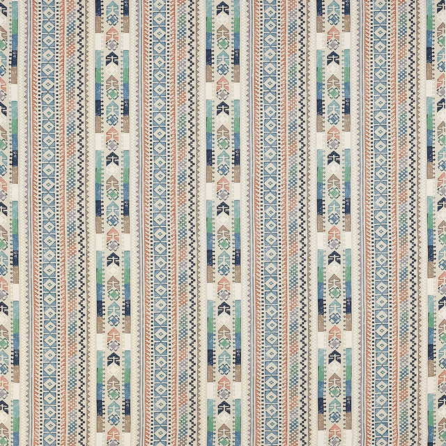 Pale blue striped fabric with tiny geometric motifs in teal, coral and navy